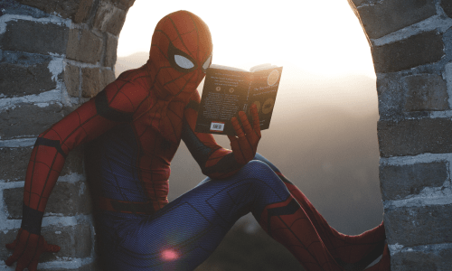 Spider-Man reading a book